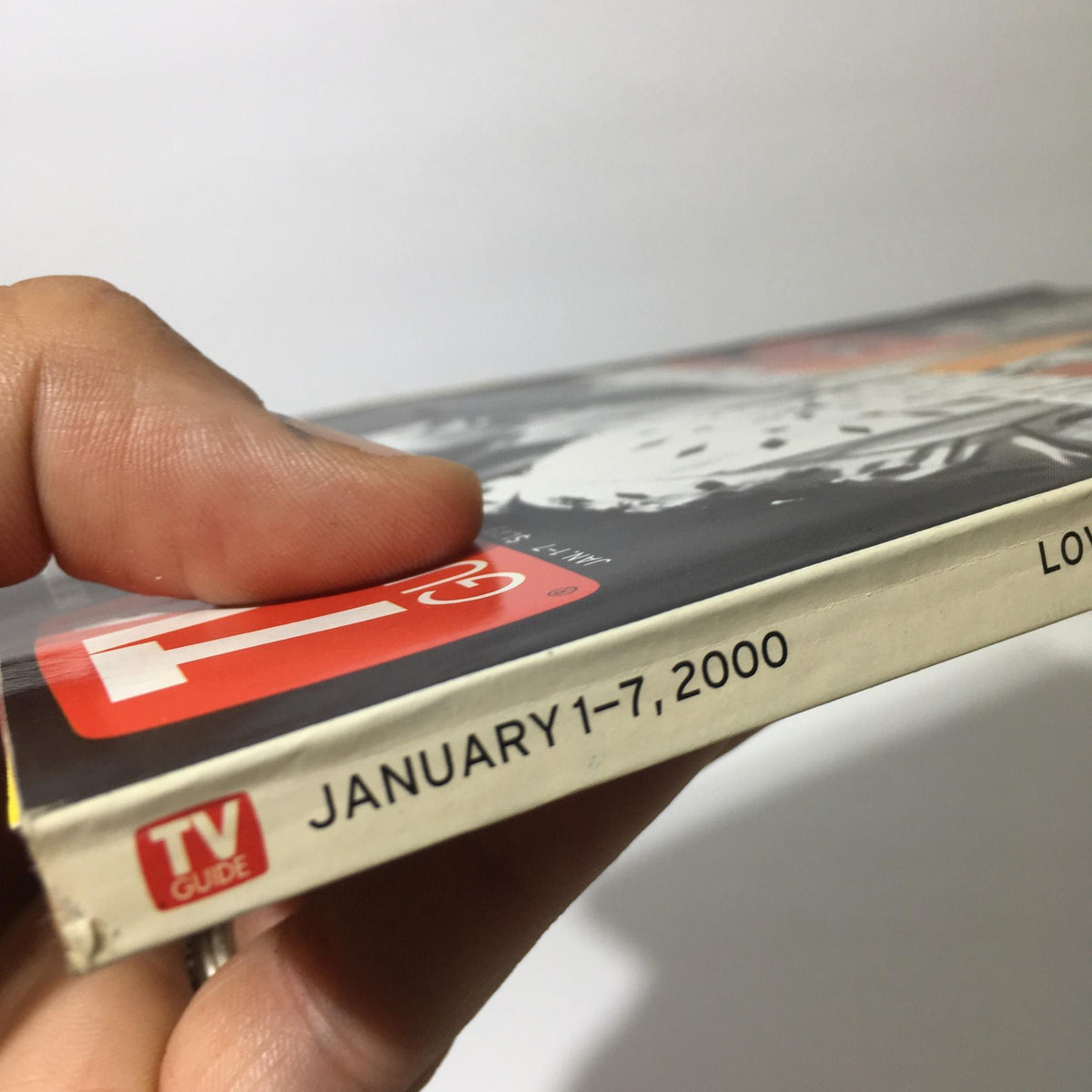 Side view of the TV Guide January 1-7, 2000 featuring Elvis Presley as the Entertainer of the Century, showcasing the publication date.