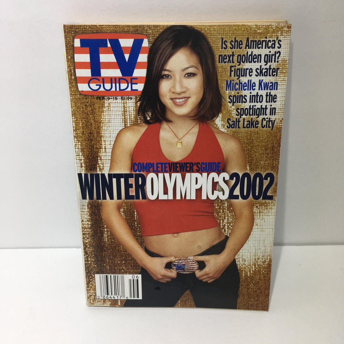 TV Guide cover from February 9-15, 2002 featuring Michelle Kwan, titled 'America's Next Golden Girl', highlighting Winter Olympics 2002.