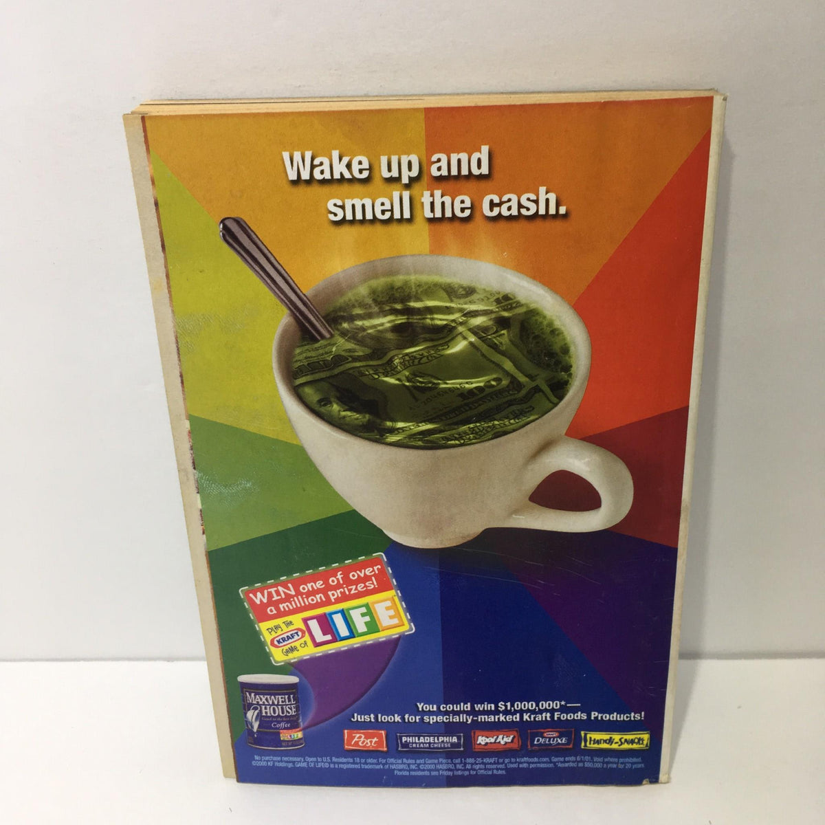 Back cover advertisement of the TV Guide from September 30 to October 6, 2000, featuring a colorful graphic and promotional text.