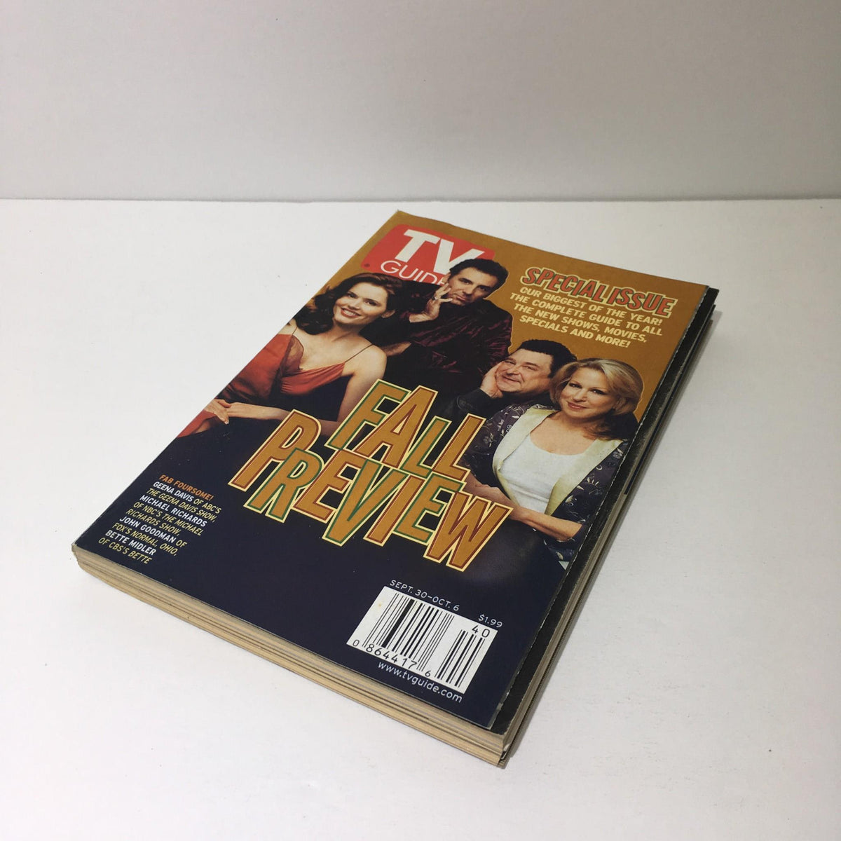 Vintage TV Guide magazine from September 30 to October 6, 2000 featuring a Fall Preview with stars G Davis, M Richards, J Goodman, and B Midler. This collectible issue showcases television programming from the early 2000s.