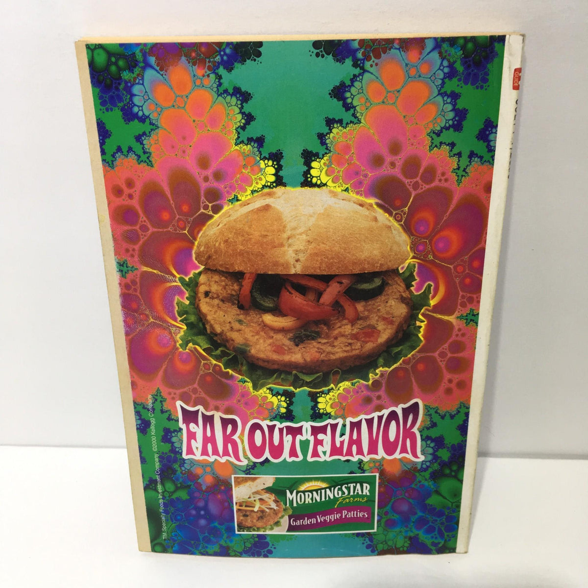TV Guide July 1-7 2000 featuring a colorful food advertisement titled 'Far Out Flavor' for Morningstar Garden Veggie Patties, showcasing a vibrant psychedelic design.