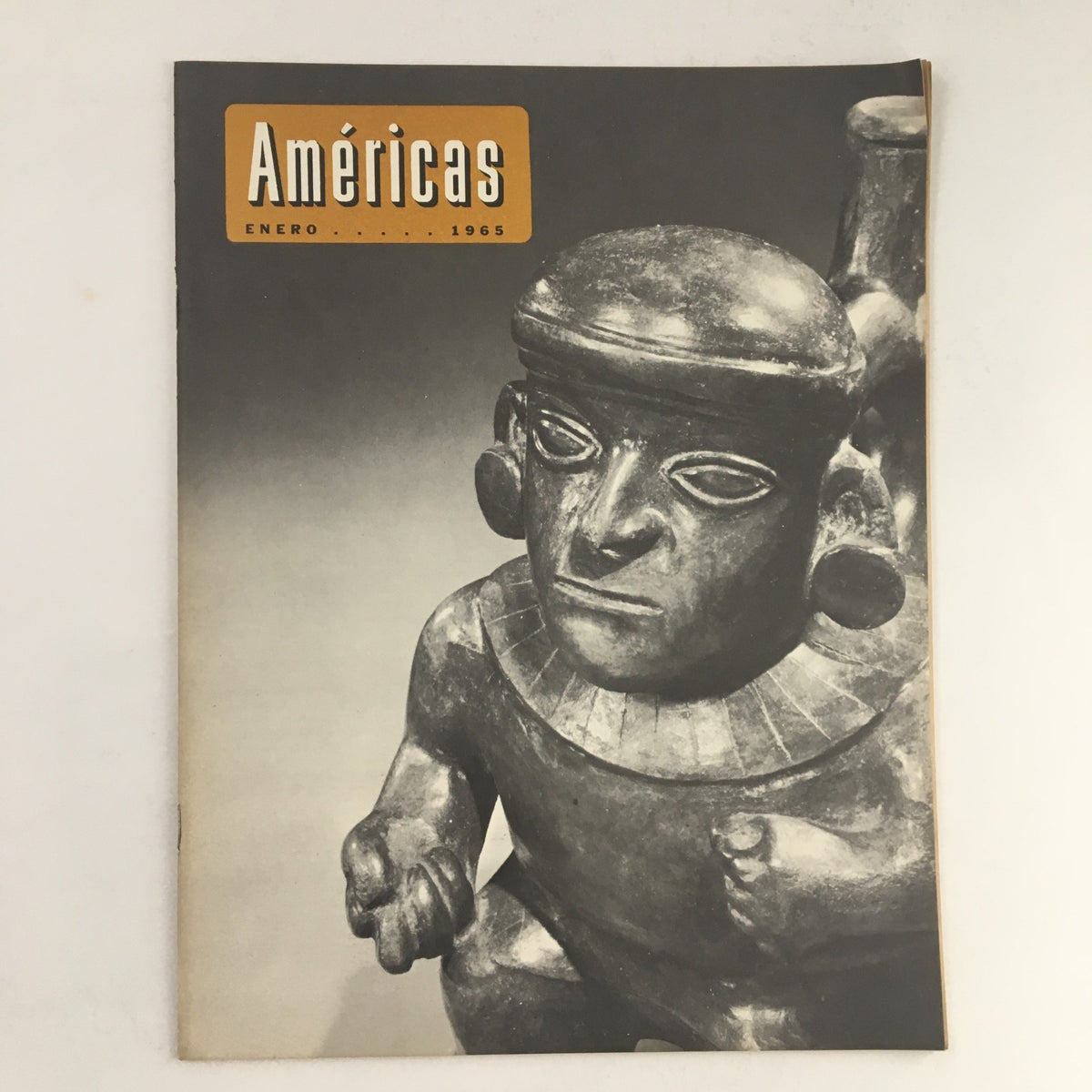 Cover of AmeriCAs Magazine January 1965 featuring a detailed photograph of an ancient artifact, showcasing the rich culture and history of the Americas.