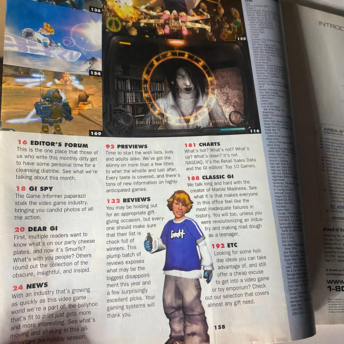 Inside pages of Game Informer Magazine November 2003 Issue 127, displaying the editorial section with gaming previews and charts, representing the vibrant gaming culture of the early 2000s.