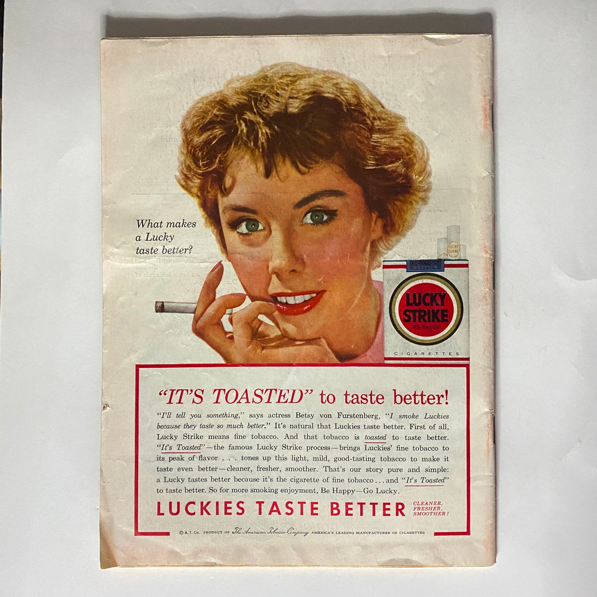 Back cover of VTG Time Magazine June 28, 1954, featuring an advertisement for Lucky Strike cigarettes with a vintage design, showcasing 1950s marketing.