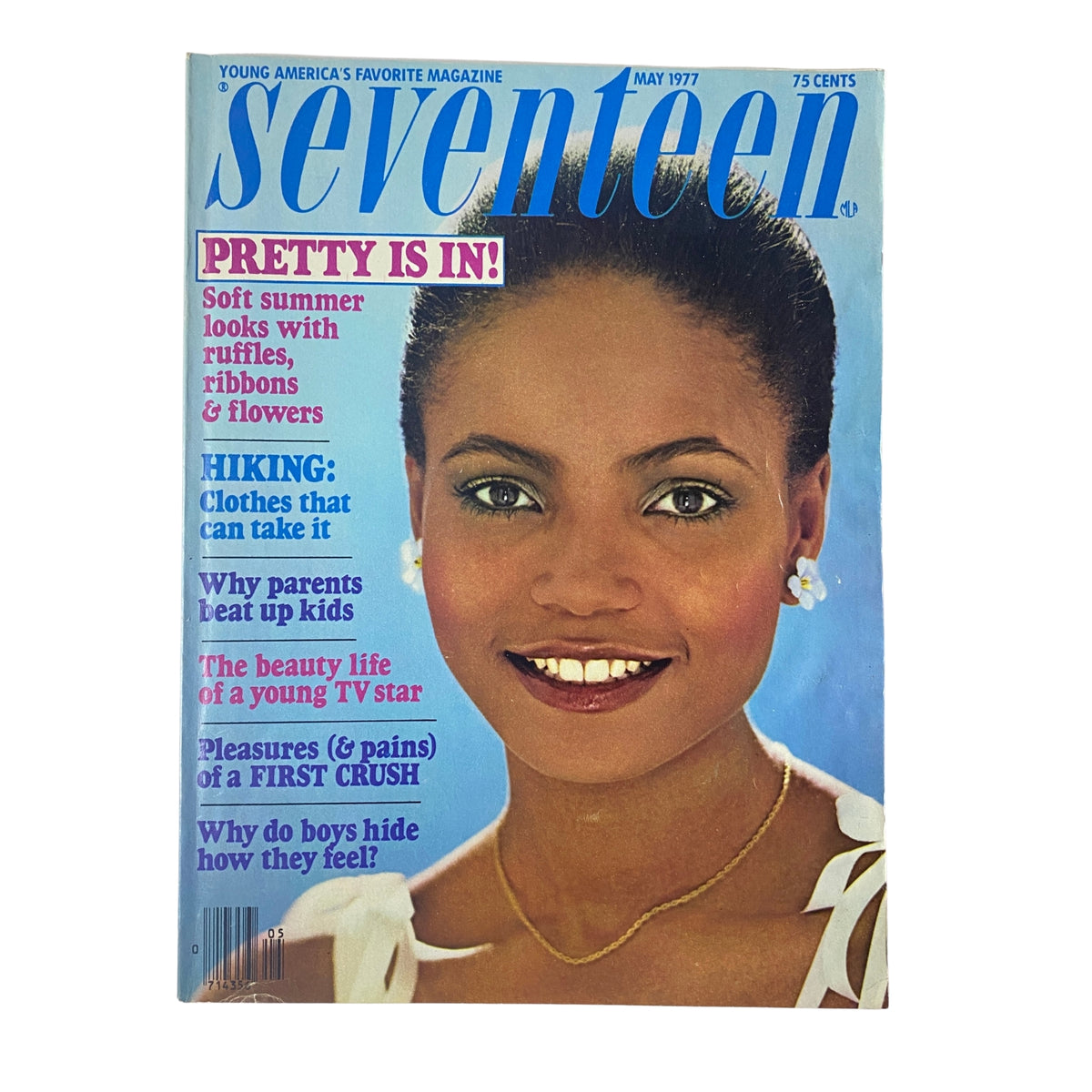 Seventeen Magazine May 1977 cover featuring a woman with earrings, highlighting articles on summer fashion and hiking, with the title 'Pretty Is In'.