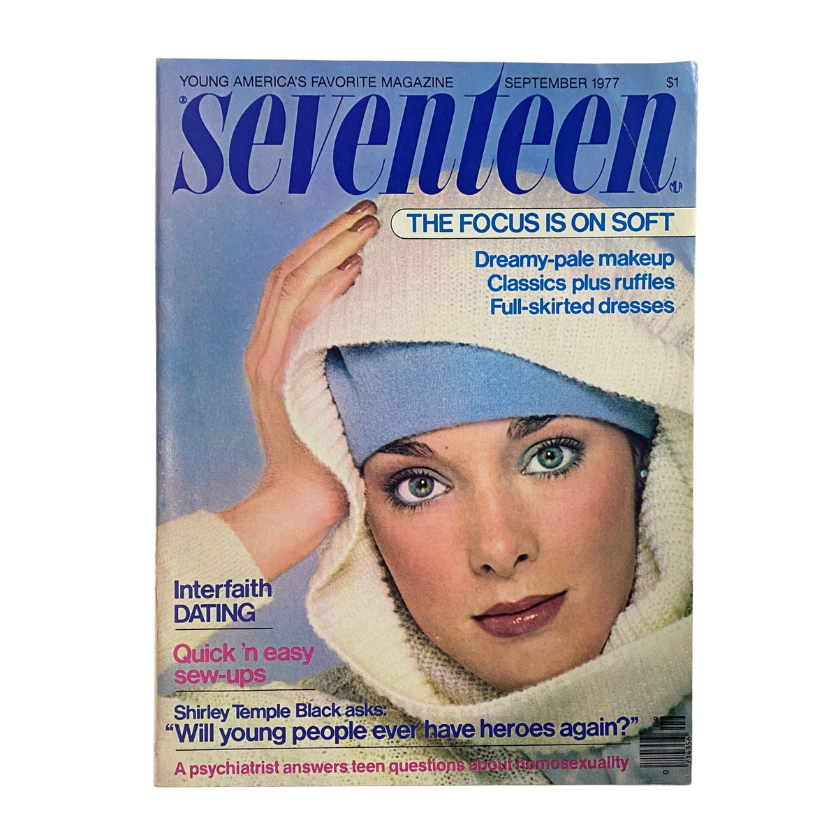 Cover of Seventeen Magazine September 1977 featuring a young woman in a white sweater, highlighting dreamy-pale makeup and classic ruffles. This issue, featuring a Shirley Temple Black special, addresses topics like interfaith dating and youth culture.