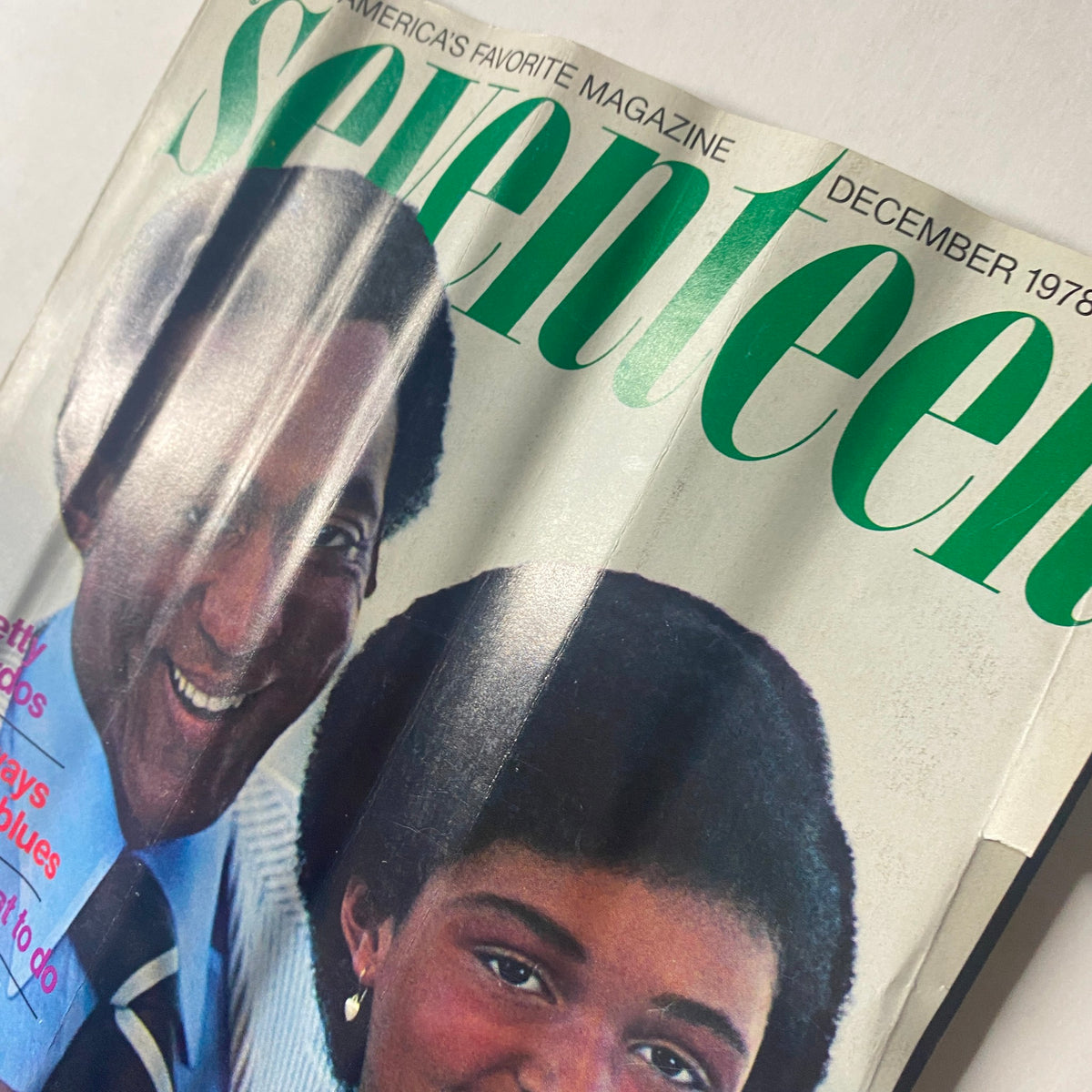 Close-up of the Seventeen Magazine December 1978 cover showing Bill Cosby and Erika Cosby, emphasizing festive hairstyles and seasonal articles.