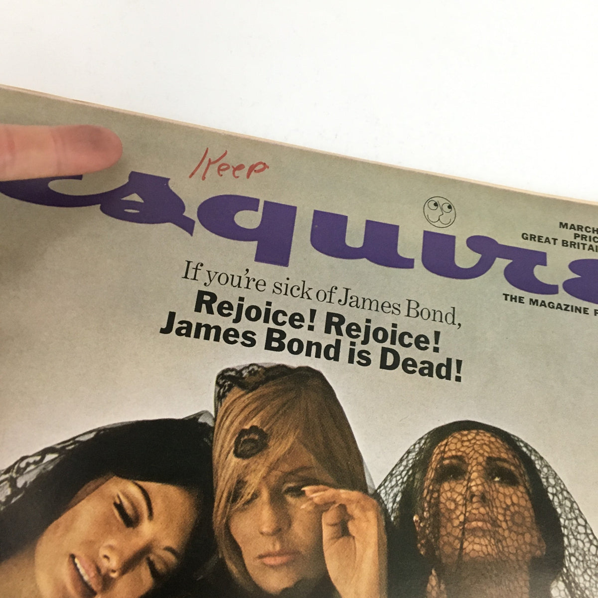 Close-up of the Esquire Magazine March 1967 cover emphasizing the title 'Rejoice! Rejoice! James Bond is Dead!' with a handwritten note 'Keep' in red ink.