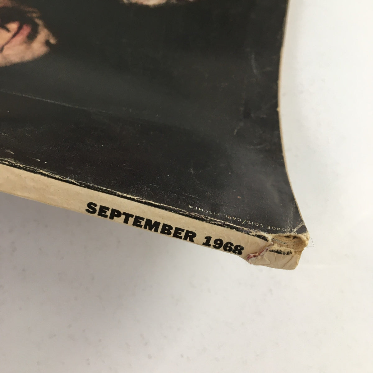 Close-up view of the spine of Esquire Magazine September 1968, displaying the publication date and minor wear, indicative of its vintage character.