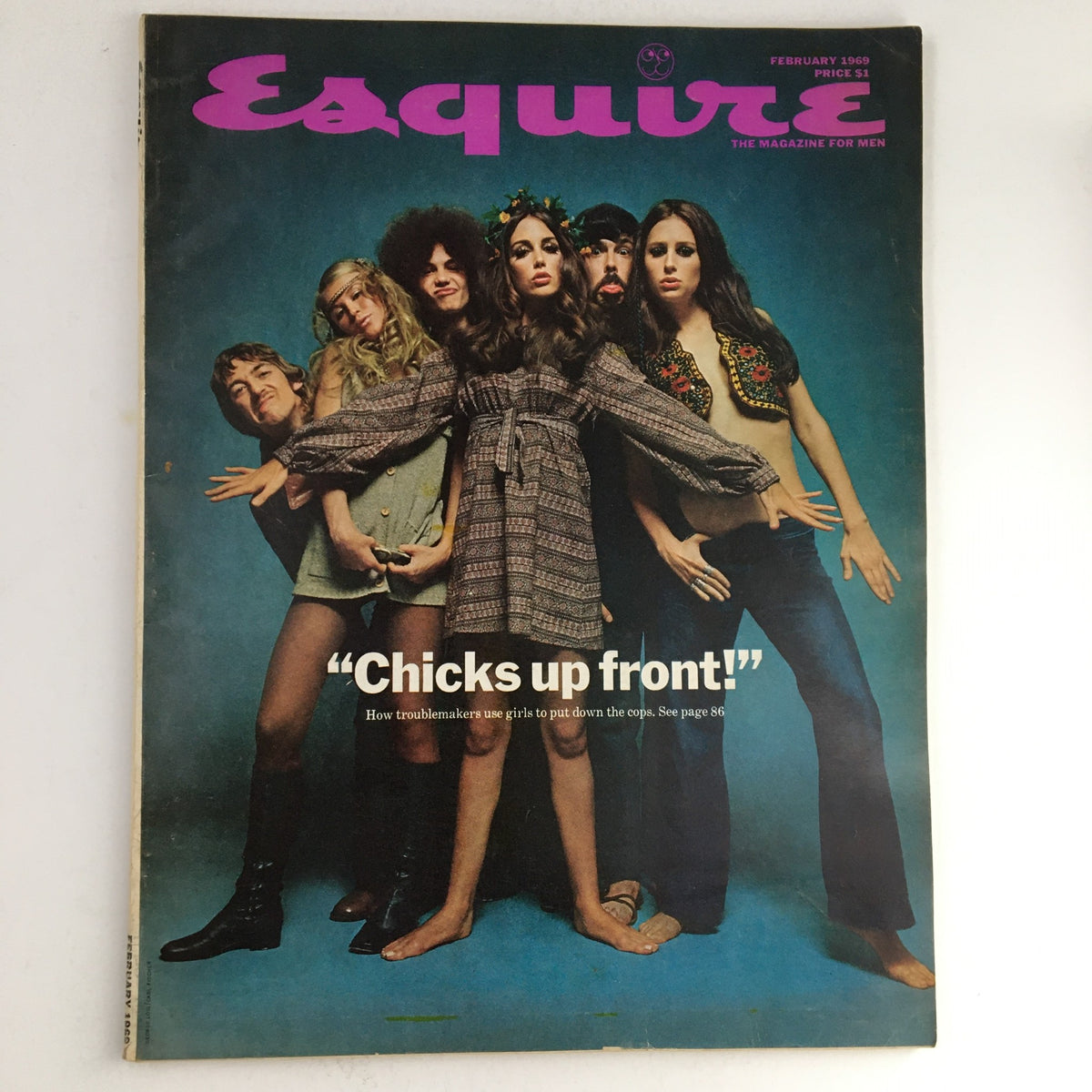 Esquire Magazine February 1969 cover featuring the title 'Chicks up front!' showcasing a group of young individuals in 1960s fashion, representing the cultural shifts of the era.