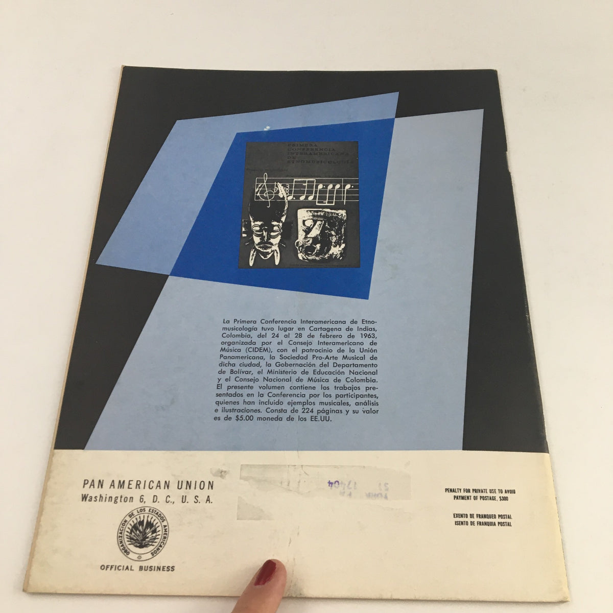Back cover of Americas Magazine July 1965 with a blue geometric design and text, adding historical context to the magazine.