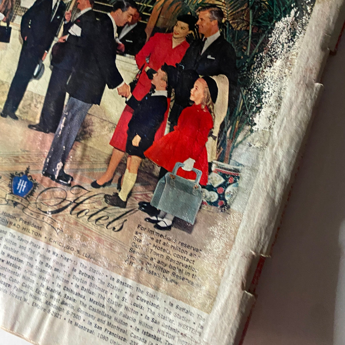 Vintage Time Magazine May 20, 1957 featuring Cardinal Stefan Wyszyński with an advertisement showing a family engaging with hotel services, showcasing historical context and vintage design.