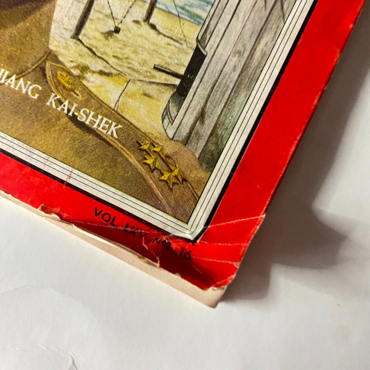 Close-up of the lower corner of the VTG Time Magazine cover from April 18, 1955, highlighting the detailed design and the title 'Chiang Kai-Shek' within an illustrated context.