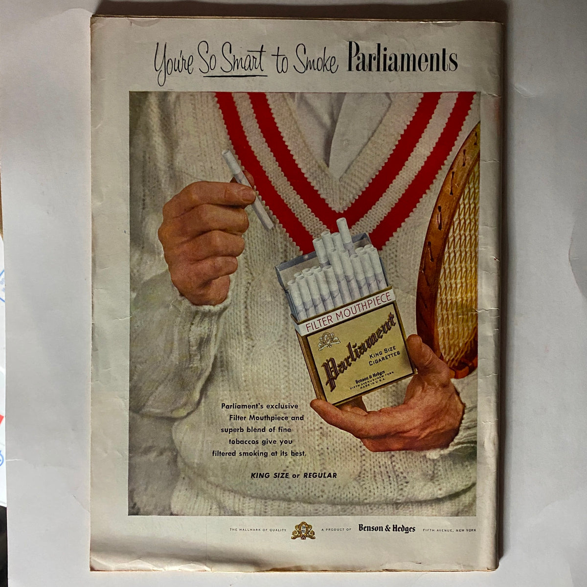 Vintage advertisement from Time Magazine August 2, 1954 showcasing Parliament cigarettes. The image features a gentleman holding a pack of cigarettes with a charming retro design, highlighting the brand's Filter Mouthpiece. This ad reflects mid-20th century consumer culture.