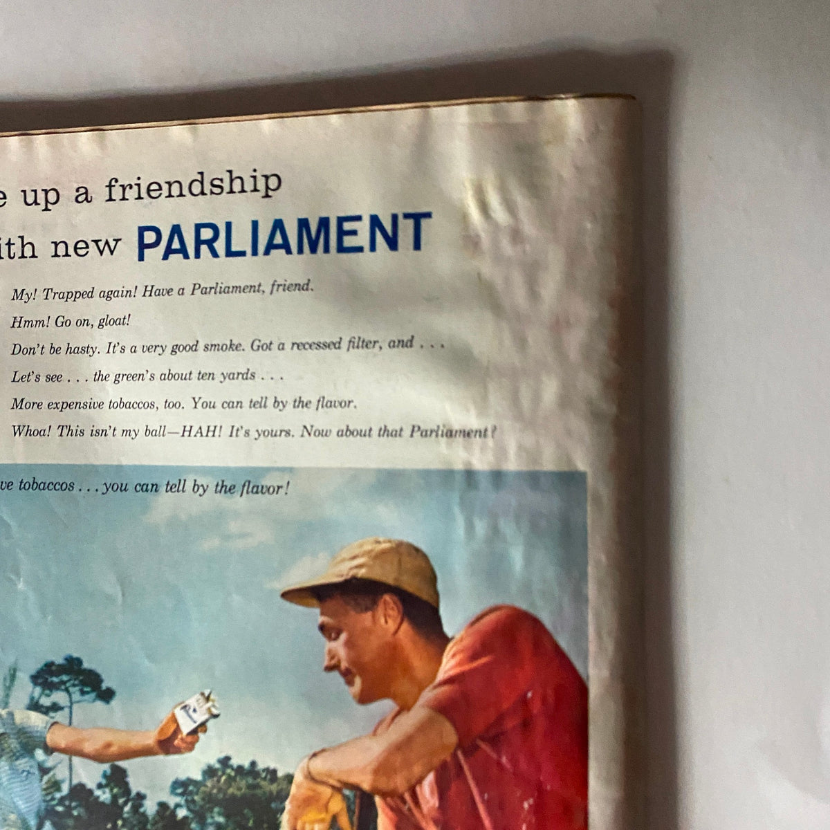 Close-up of the advertisement on the back cover of VTG Time Magazine July 8, 1957 featuring a playful dialogue about Parliament cigarettes, highlighting mid-century marketing.