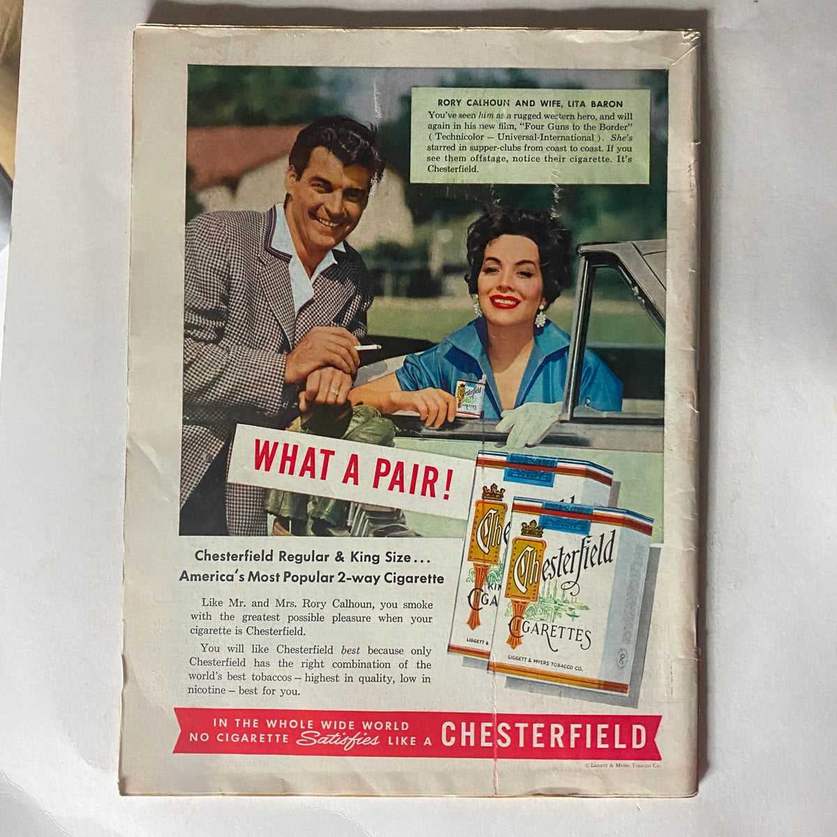Back cover advertisement of VTG Time Magazine January 10, 1955 showcasing a Chesterfield cigarette ad featuring actors Rory Calhoun and Lita Baron.