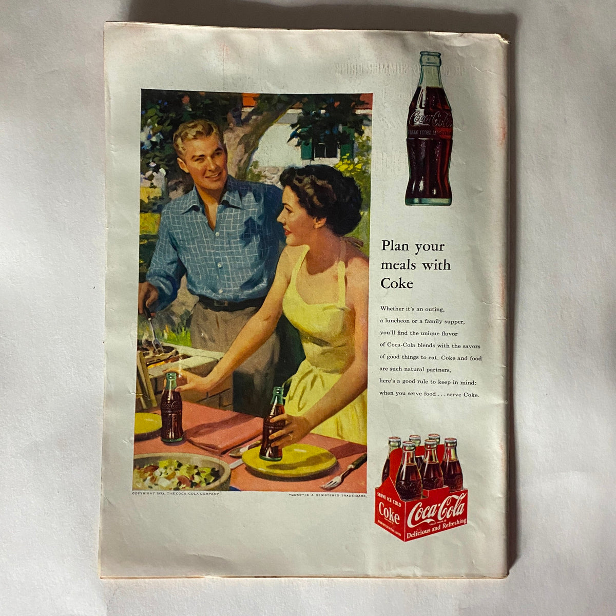 Back advertisement page of Vintage Time Magazine July 6, 1953 Vol 62 No. 1 featuring a Coca-Cola promotional illustration with a couple.