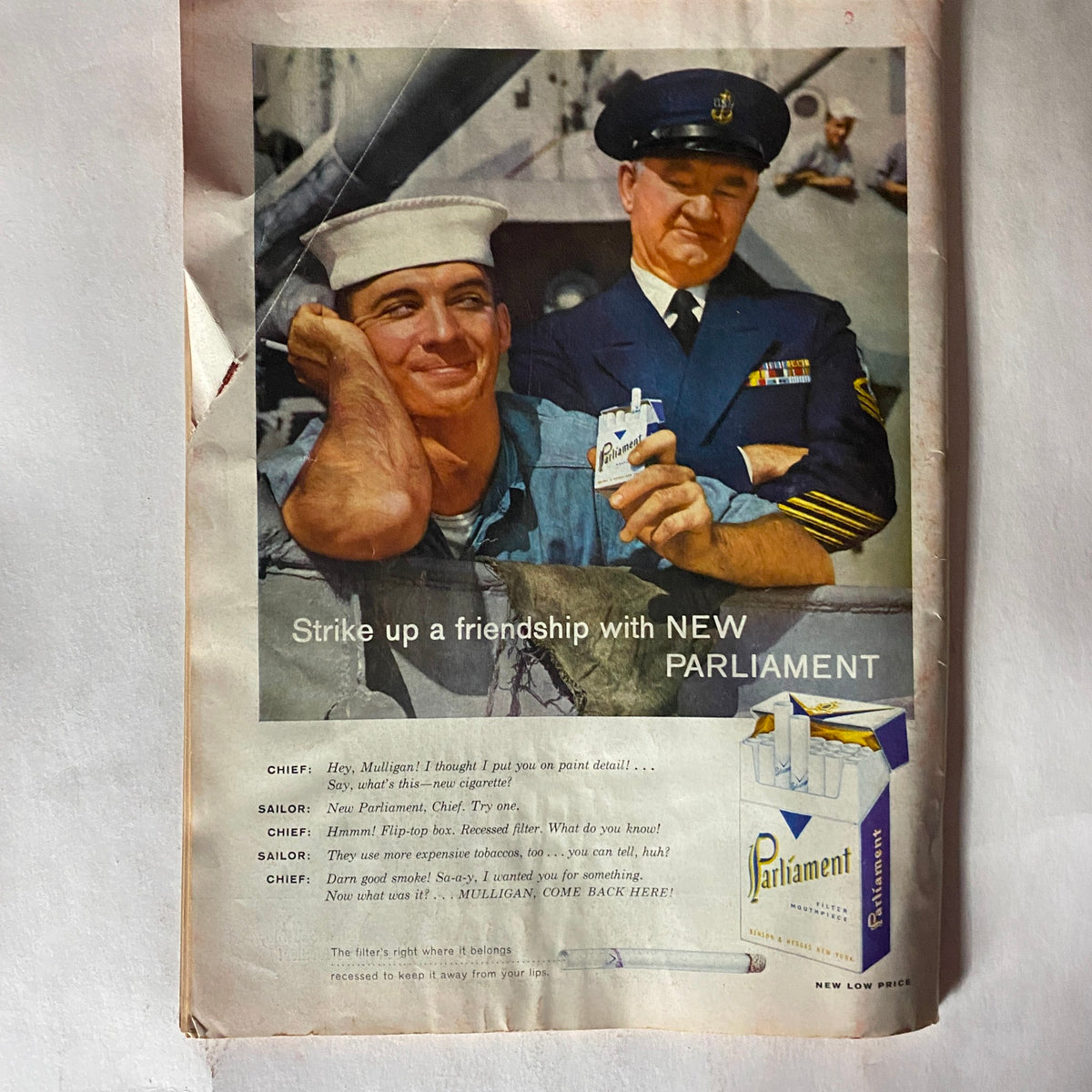 Vintage advertisement from Time Magazine March 18, 1957, featuring a sailor and chief promoting New Parliament cigarettes, reflecting the mid-20th century culture.