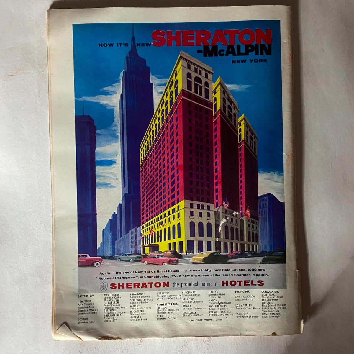 Advertisement page from VTG Time Magazine February 4, 1957 promoting the Sheraton-McAlpin hotel in New York with colorful graphics.