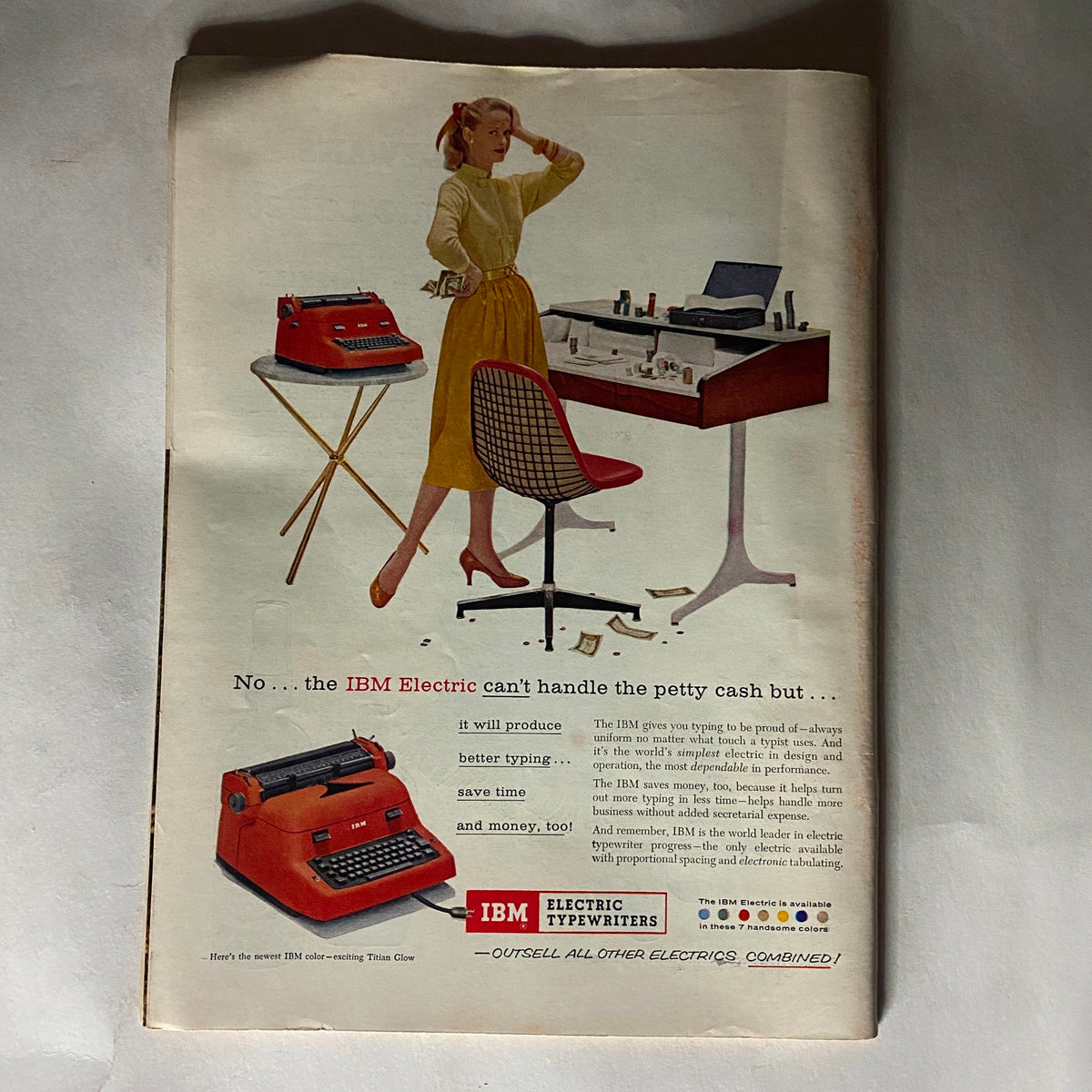 Vintage advertisement from Time Magazine January 28, 1957 featuring an IBM Electric typewriter and a woman in a stylish outfit. The ad highlights the benefits of IBM Electric typewriters, emphasizing better typing and time-saving advantages. This image accompanies the issue showcasing Saudi Arabia's King Saud.