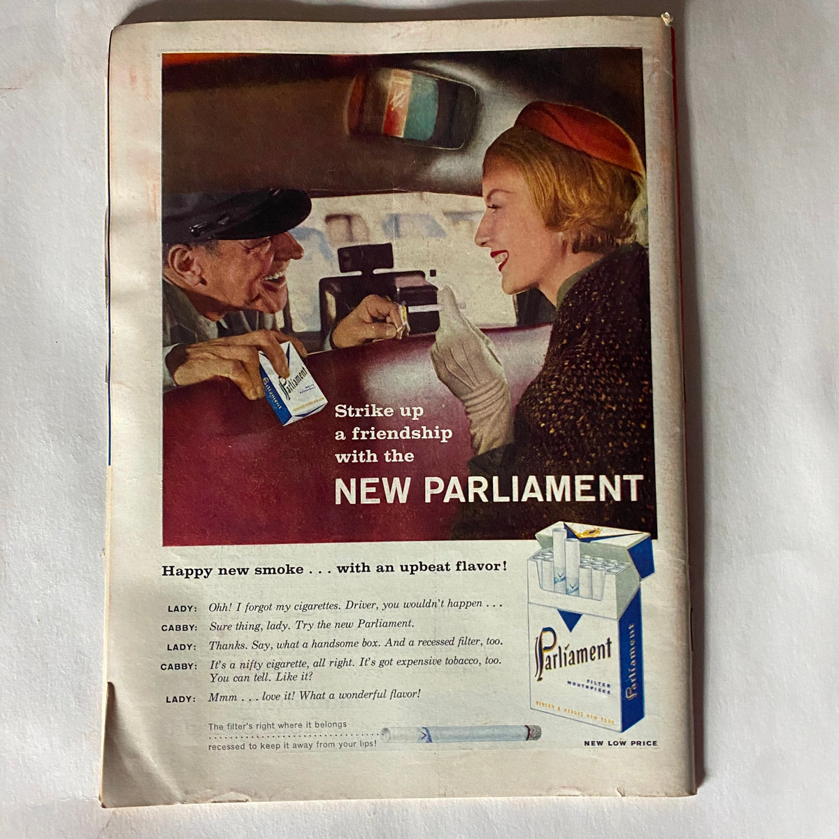 Vintage advertisement from VTG Time Magazine January 21, 1957 Vol 69 No. 3 promoting Parliament cigarettes with a conversation between a cab driver and a lady.