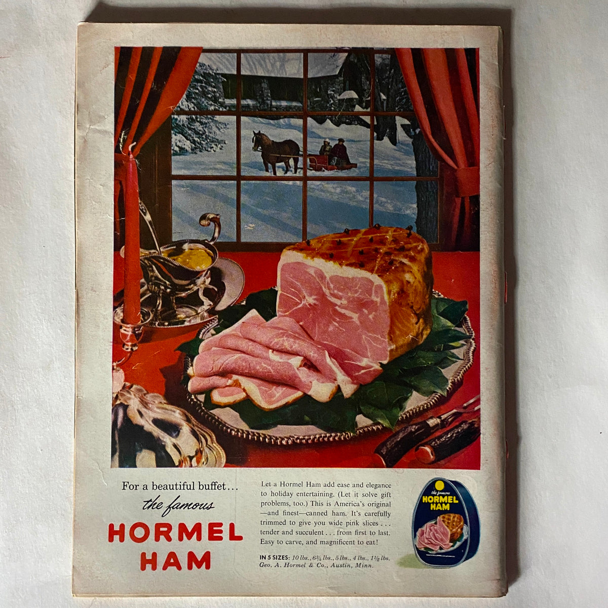 Back cover of the December 3, 1956 Time Magazine, advertising Hormel Ham with a seasonal holiday theme and picturesque winter scene.