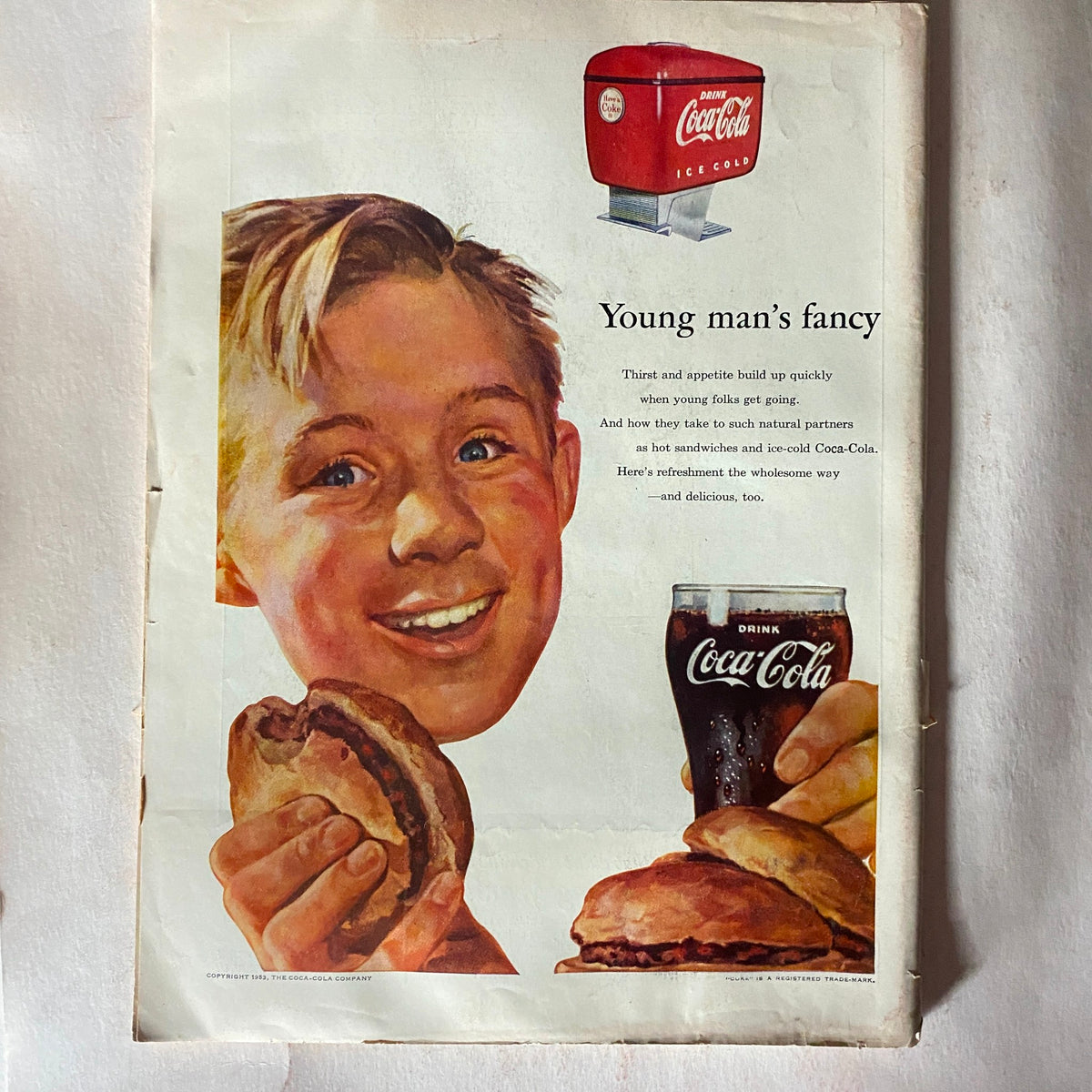 Back cover of VTG Time Magazine May 11, 1953, showcasing a colorful advertisement for Coca-Cola, featuring a young boy enjoying a sandwich and a drink.