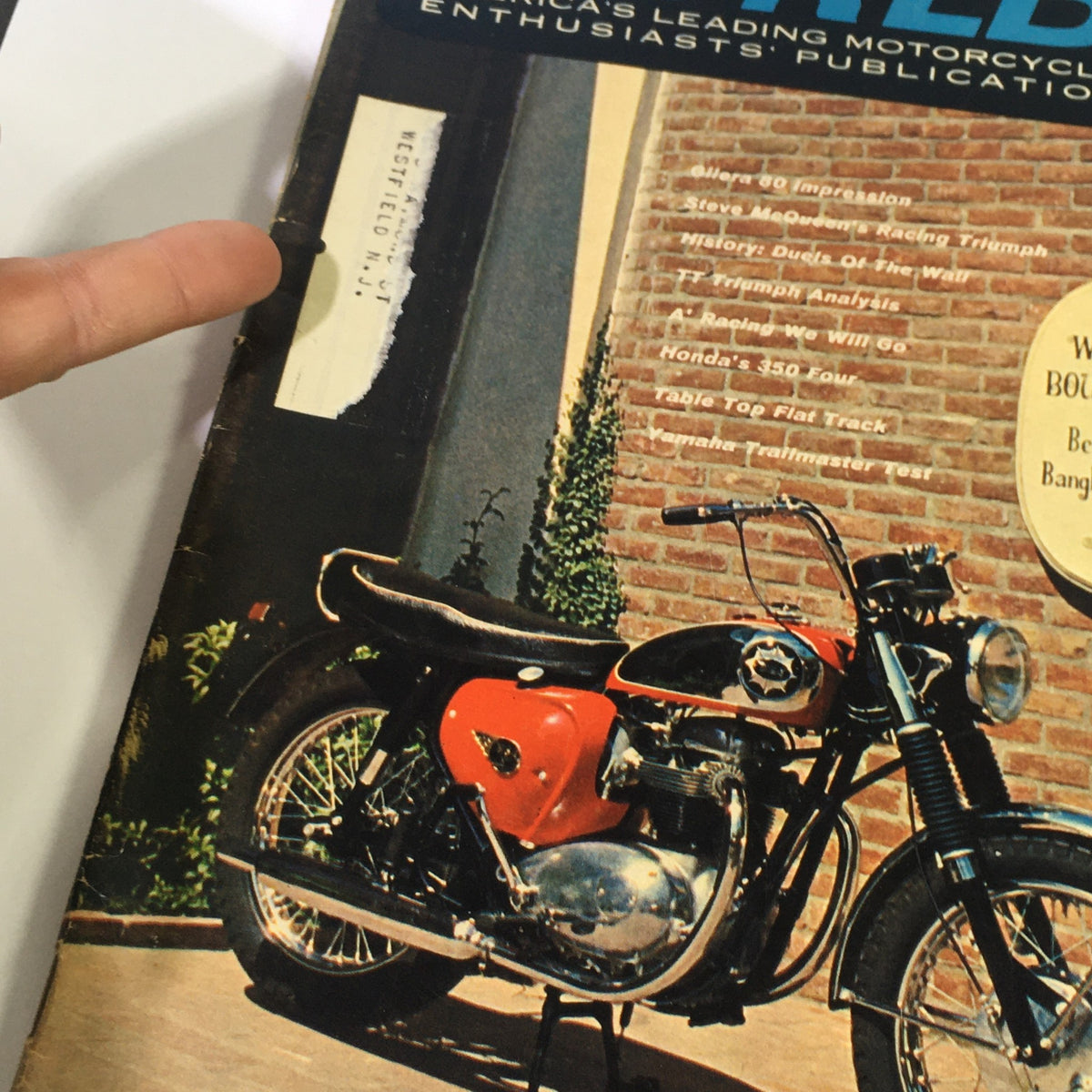 Cover of VTG Cycle World Magazine from June 1964 featuring BSA Lightning Rocket and Dot Scrambler tests, showcasing a vintage motorcycle set against a brick wall background. The issue highlights key motorcycle features and historical insights into 1960s biking culture.