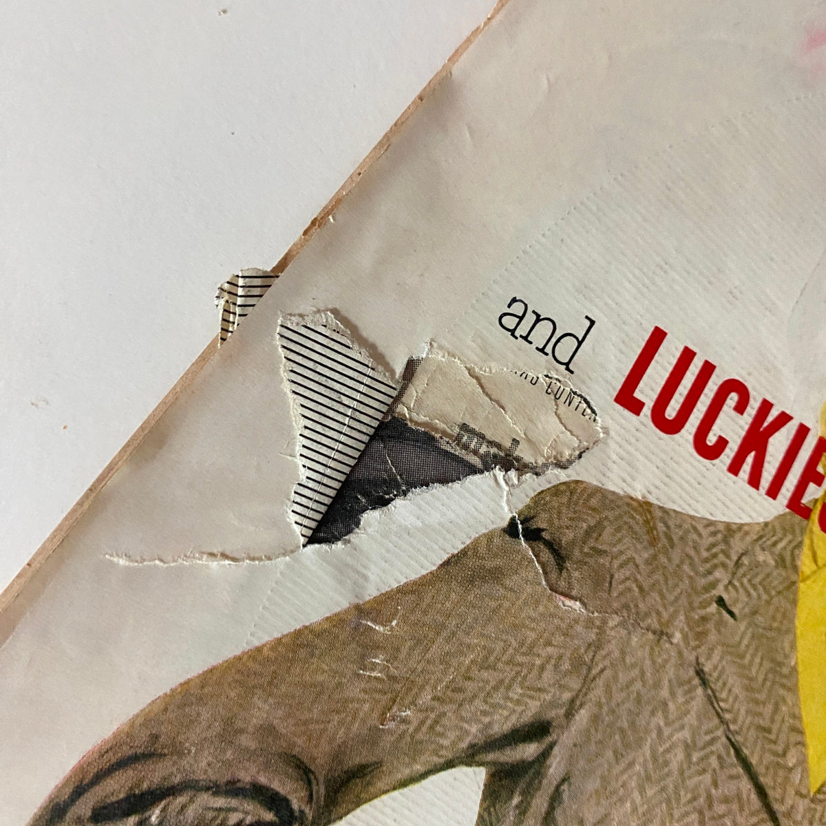 Close-up of the damaged edge of the VTG Time Magazine May 4, 1953 cover featuring Oveta Culp Hobby, highlighting wear and tear on this vintage publication.