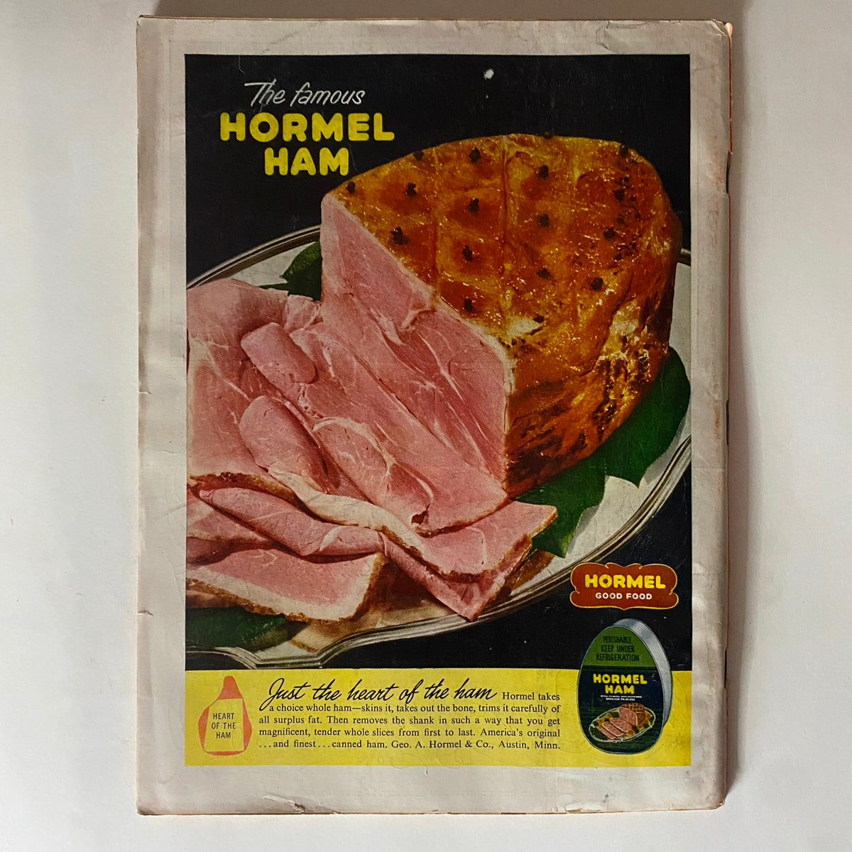 Vintage advertisement for Hormel Ham featuring a beautifully plated dish of ham slices next to a whole baked ham. The ad emphasizes quality with the phrase 'Just the heart of the ham' and showcases the Hormel brand. This ad is from the VTG Time Magazine dated December 8, 1952, Vol 60 No. 23, celebrating space exploration.
