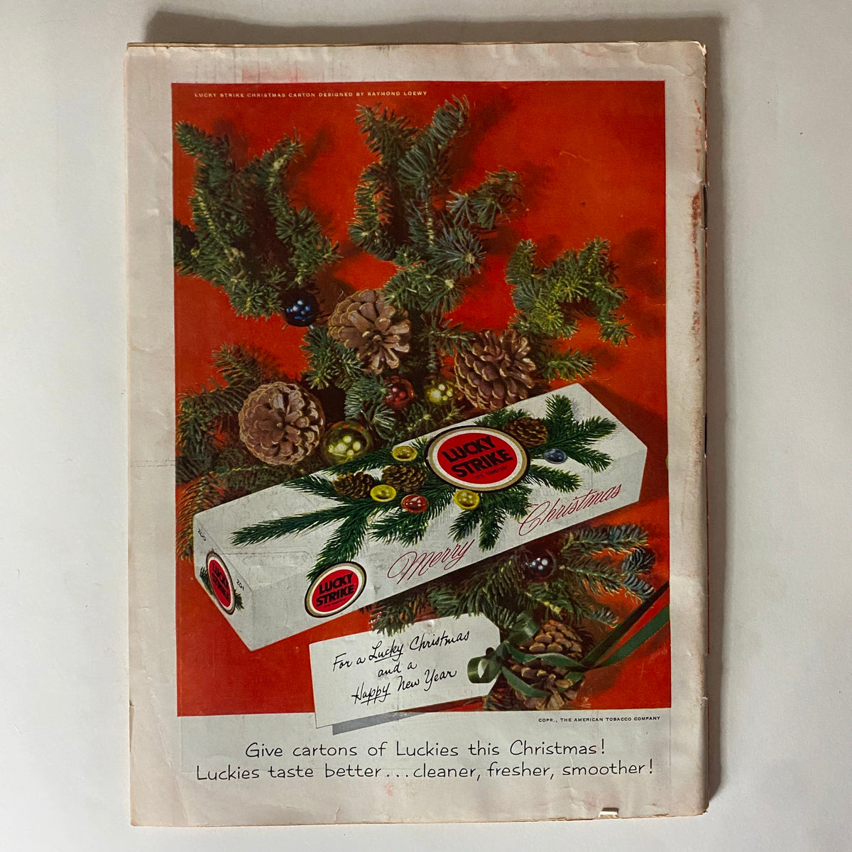 Back cover of VTG Time Magazine December 1, 1952 Vol 60 No. 22 showcasing a Lucky Strike advertisement with a festive Christmas theme.