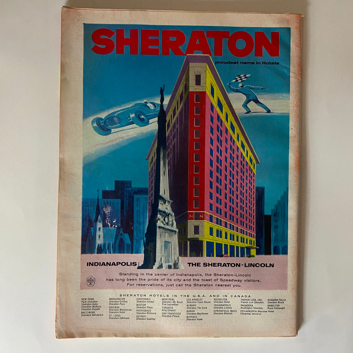 Advertisement page from the VTG Time Magazine May 21, 1956 featuring the Sheraton Hotel, promoting hotel accommodations in Indianapolis with a vibrant illustration.