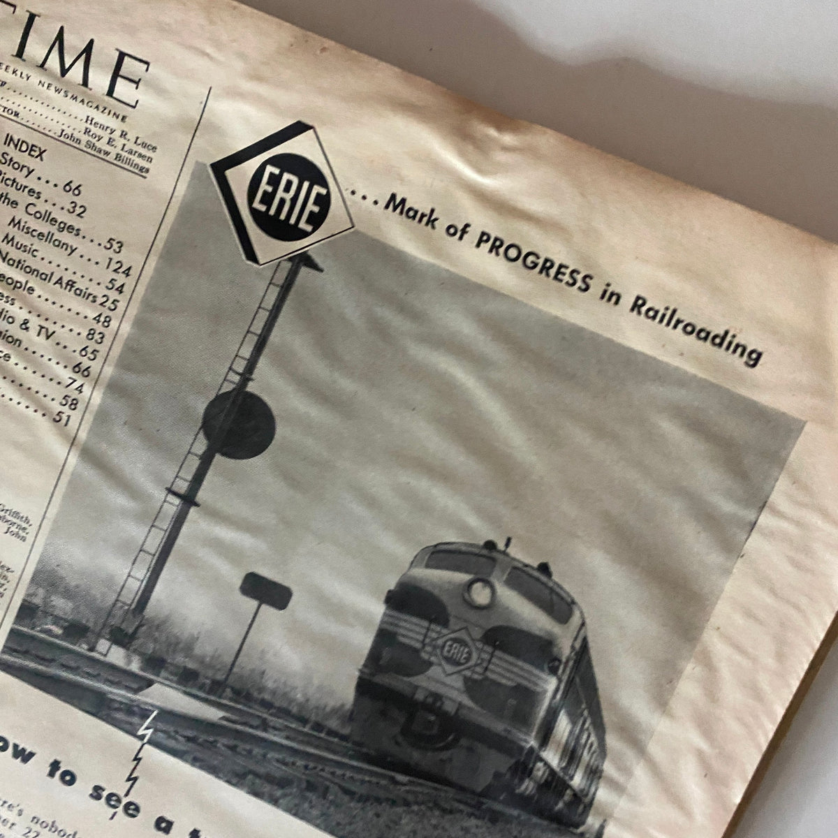 Close-up of an interior page from VTG Time Magazine April 6, 1953, highlighting an article on railroad progress with an image of an Erie train.
