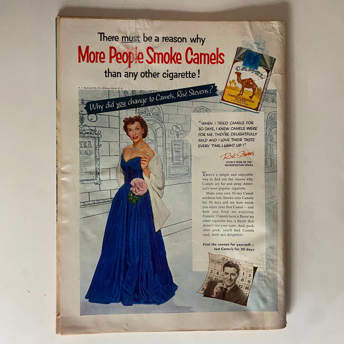 Advertisement page from VTG Time Magazine January 12, 1953 Vol 61 No. 2, featuring a glamorous model promoting Camel cigarettes, illustrating vintage advertising styles.