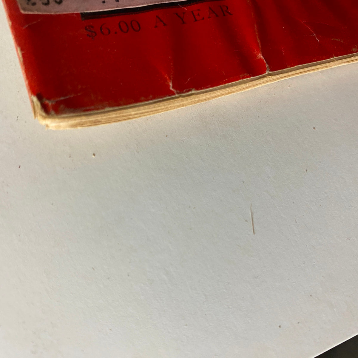 Close-up view of the spine of the vintage Time Magazine October 20, 1952, showing the publication's price and publication details.