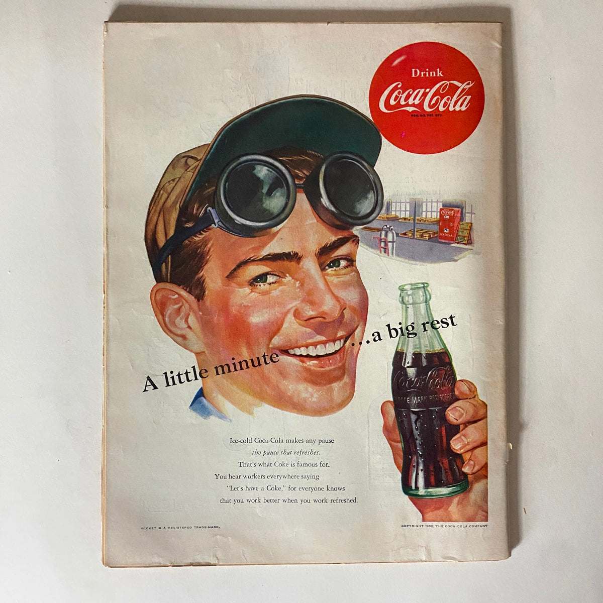 Advertisement page from VTG Time Magazine September 29, 1952 featuring a vintage Coca-Cola ad with a smiling young man holding a bottle of Coke, embodying 1950s Americana.