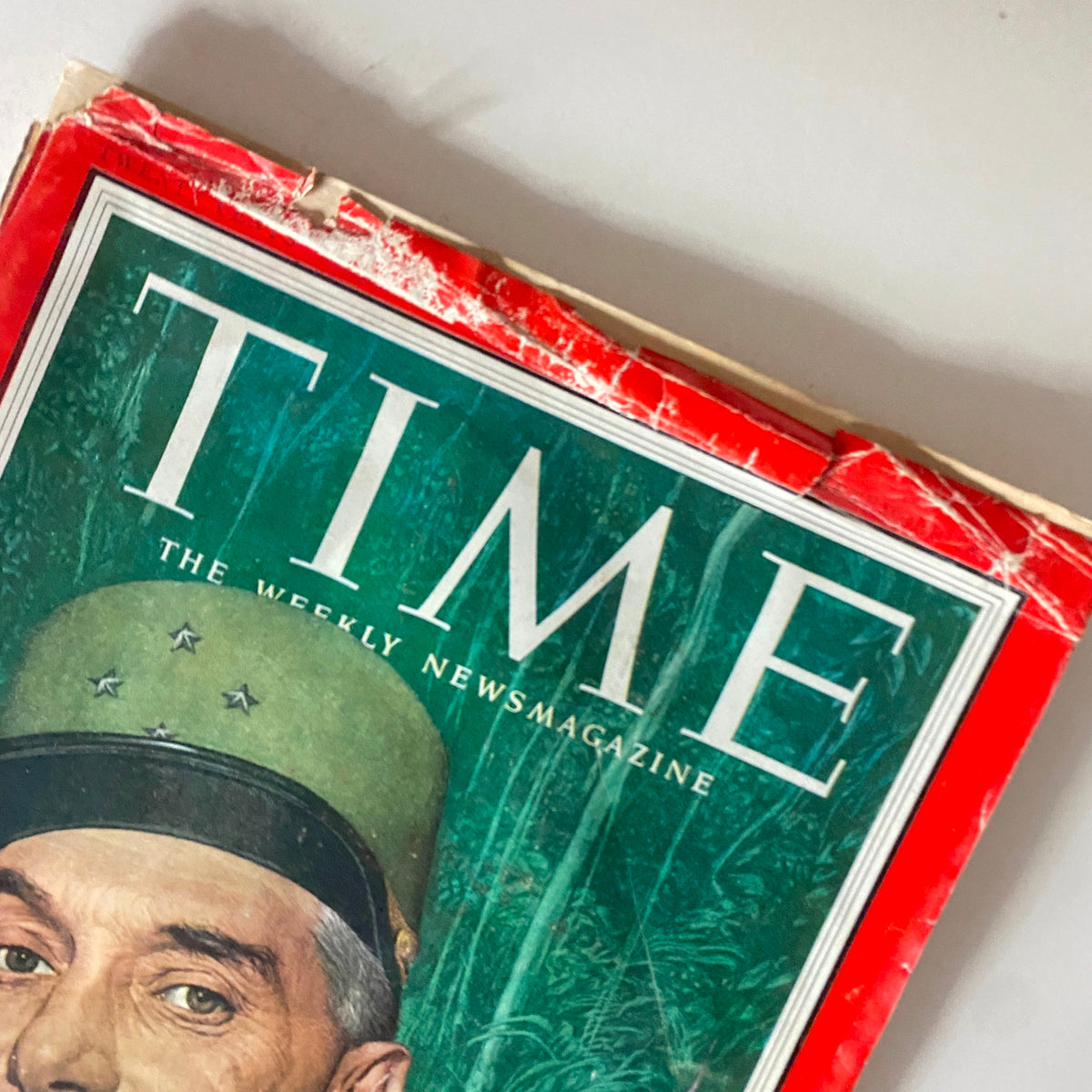 Close-up of the cover of VTG Time Magazine from September 28, 1953, showcasing the portrait of Henri Navarre against a green background with the magazine title prominently displayed.