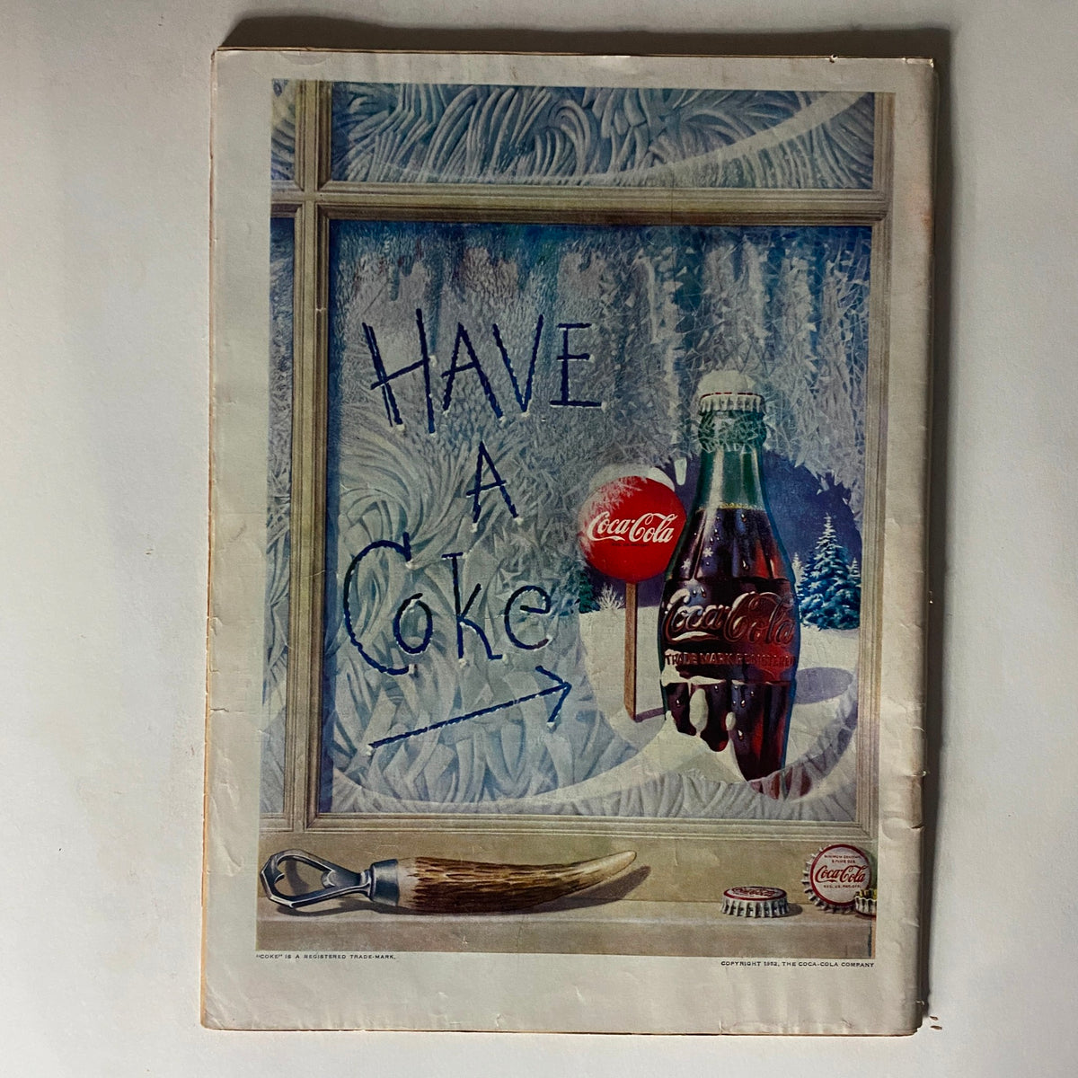 Back cover of VTG Time Magazine August 4, 1952, featuring a vintage advertisement for Coca-Cola. The advertisement emphasizes the brand with an illustration inviting readers to 'HAVE A Coke' and showcasing the classic glass bottle.