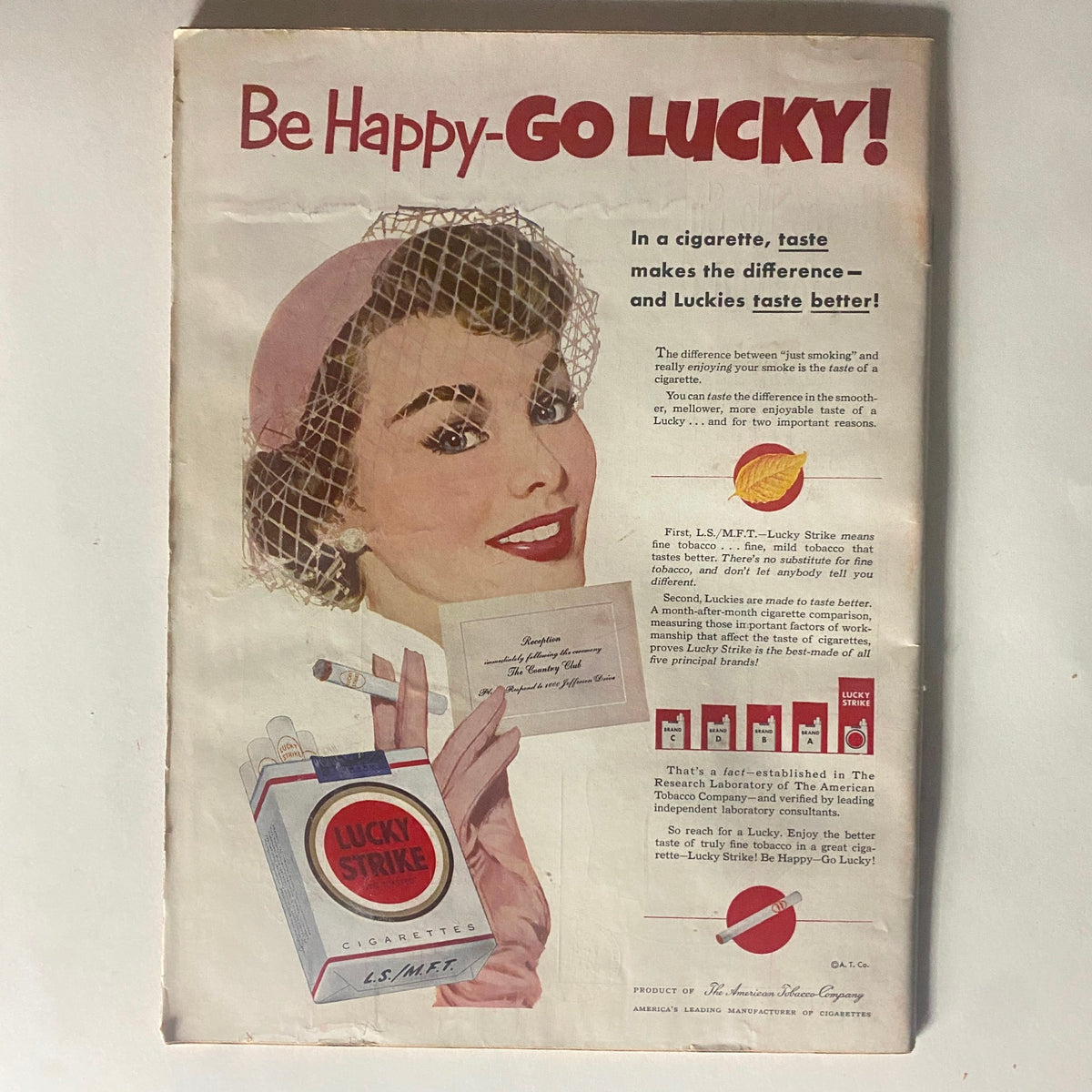 Vintage advertisement for Lucky Strike cigarettes featured in VTG Time Magazine June 2, 1952, showcasing a woman promoting the brand with a smile.