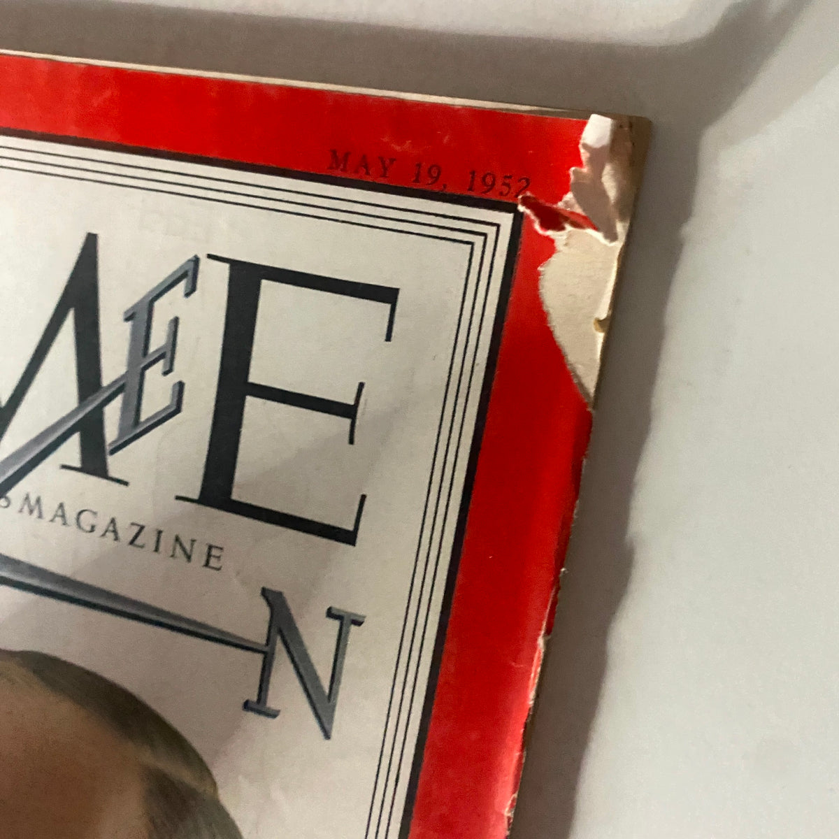 Close-up view of the top edge of the VTG Time Magazine from May 19, 1952, highlighting the magazine's title and date, with minor wear visible.