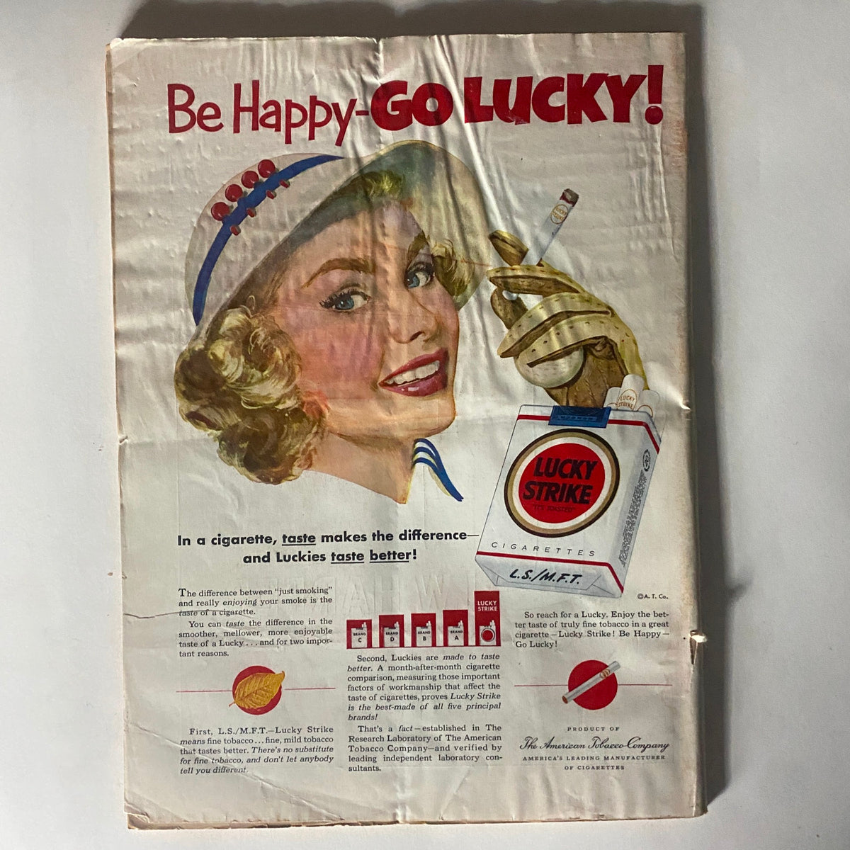 Be Happy-Go Lucky! vintage advertisement featuring a smiling woman with a cigarette and a Lucky Strike cigarette pack, promoting the brand's taste appeal. VTG Time Magazine May 5, 1952 Vol 51 No. 18.