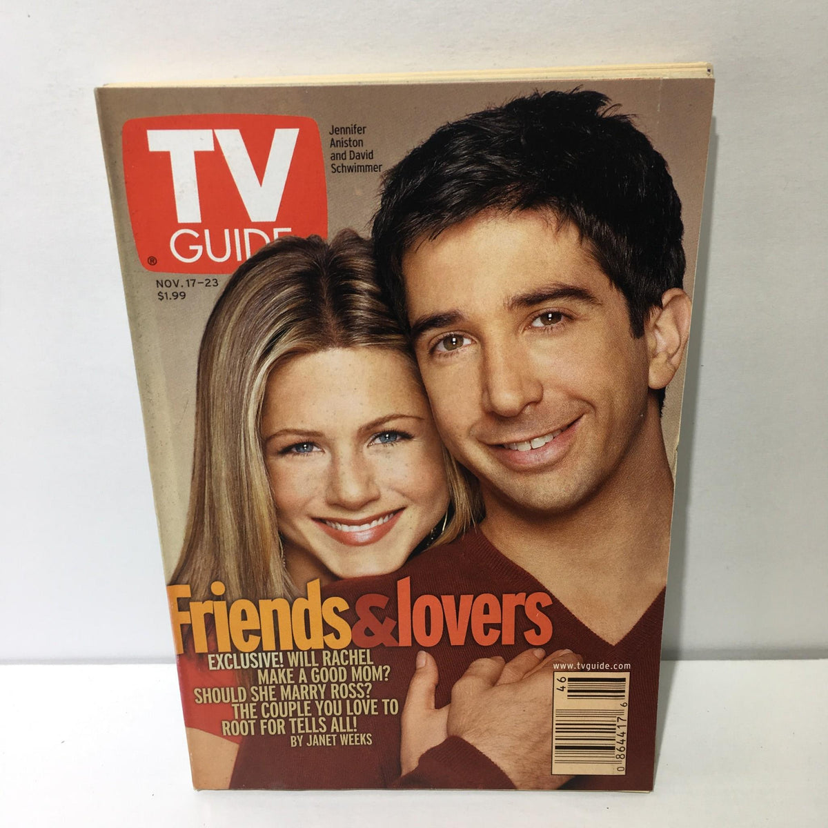 TV Guide cover from November 17-23, 2001 featuring Jennifer Aniston and David Schwimmer, captioned 'Friends & Lovers'. The magazine highlights exclusive content regarding Rachel and family storyline, appealing to fans of the iconic show.