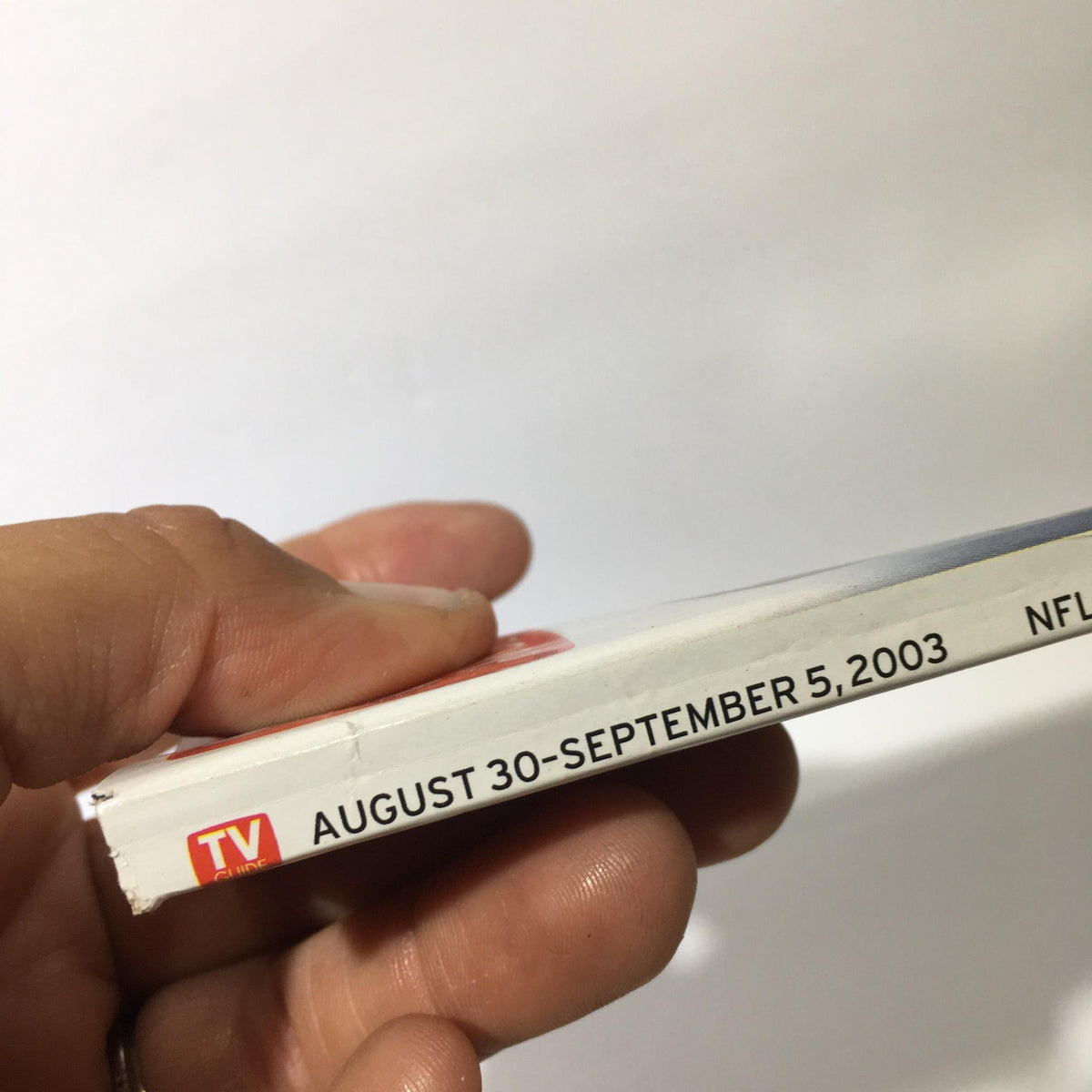 Side view of the TV Guide dated August 30-September 5, 2003, highlighting its excellent condition as a collectible vintage magazine.