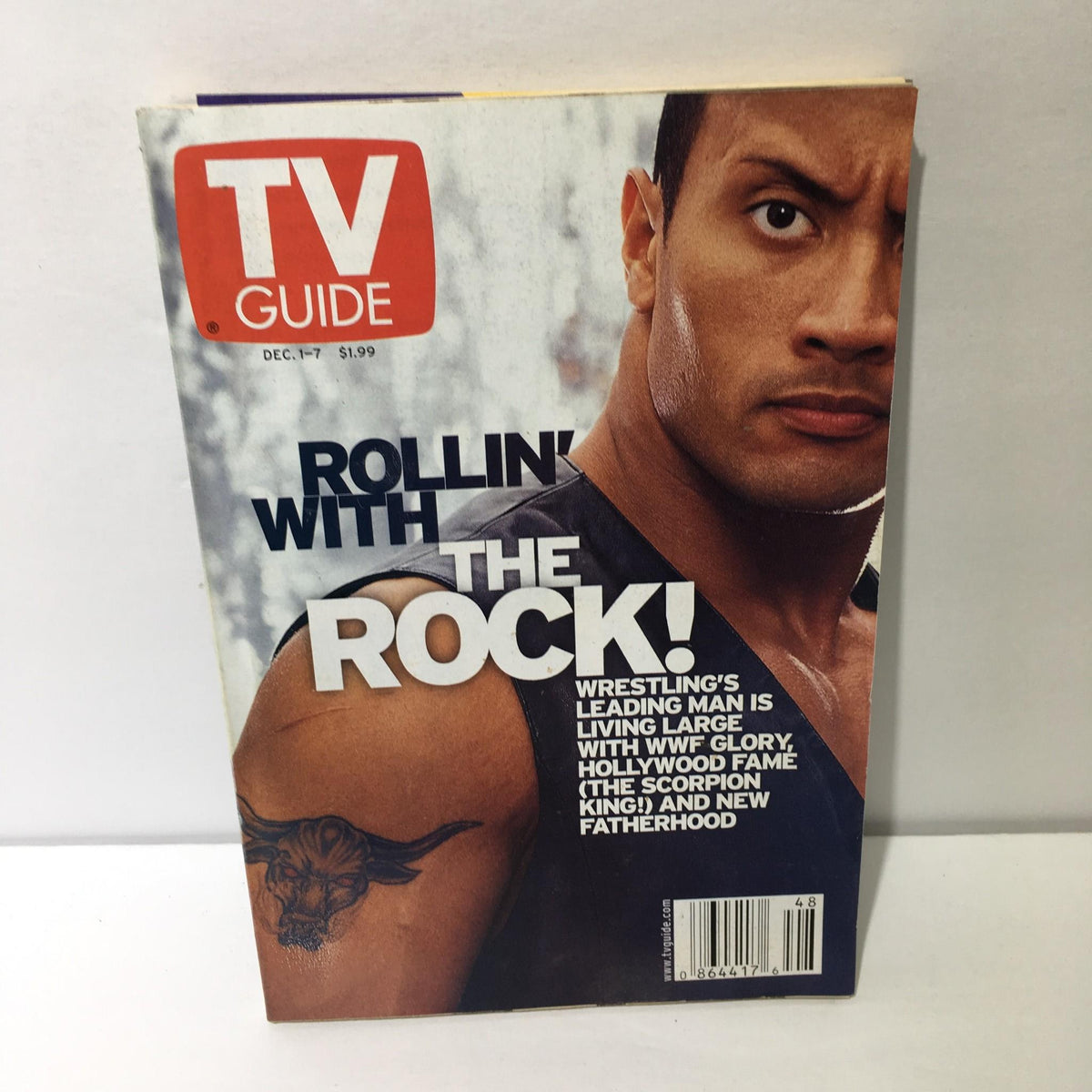 TV Guide Dec 1-7 2001 featuring Rollin' with The Rock cover, showcasing a close-up of the wrestling star.