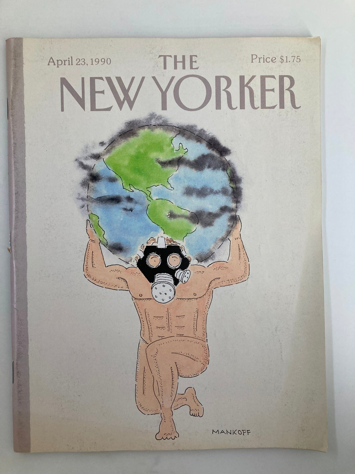 Cover of The New Yorker Full Magazine April 23 1990, featuring the illustration 'Carrying The Earth' by Robert Mankoff, depicting a muscular figure holding a globe while wearing a gas mask.