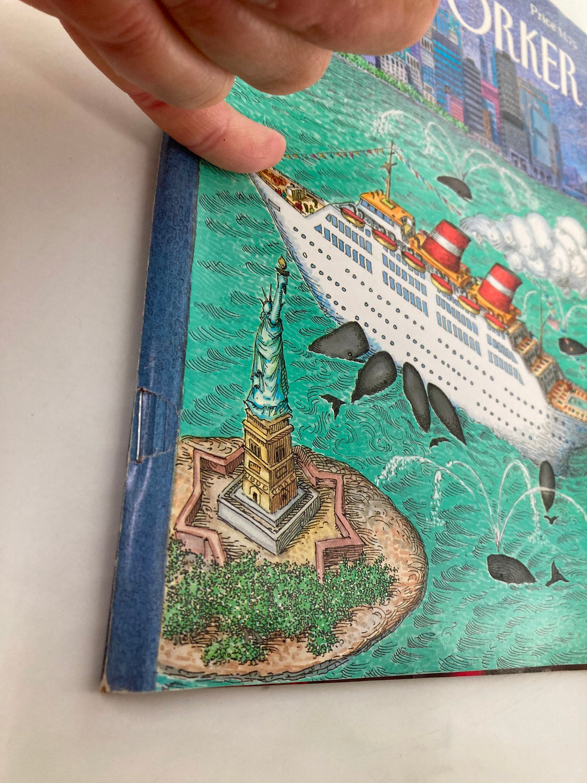 Close-up of the cover edge of The New Yorker magazine April 9, 1990, showing the Statue of Liberty and the details of the cruise ship illustration.