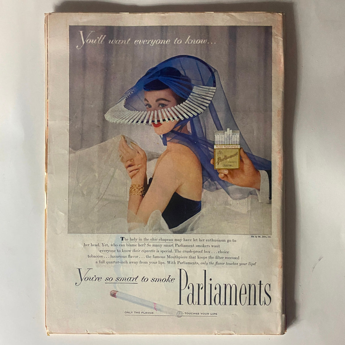 Back advertisement page of VTG Time Magazine October 24, 1955 Vol 66 No. 17 featuring a stylish woman promoting Parliament cigarettes with a vintage aesthetic.