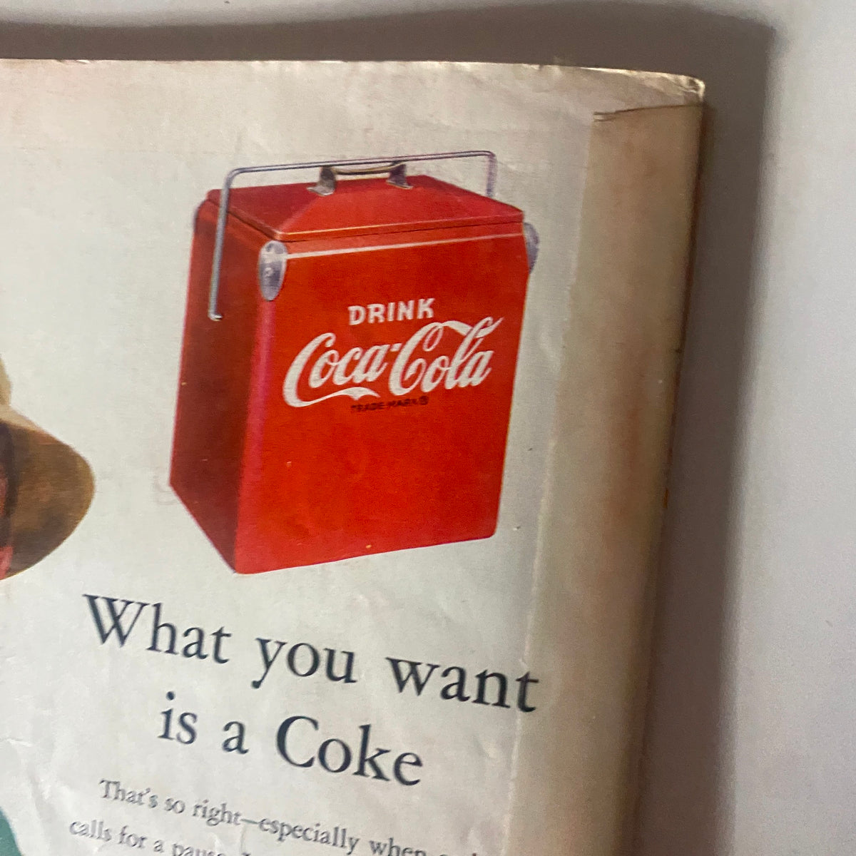 Close-up of the Coca-Cola advertisement in the vintage Time Magazine June 9, 1952 (Vol 59 No. 23), highlighting a picnic cooler and the tagline 'What you want is a Coke'.