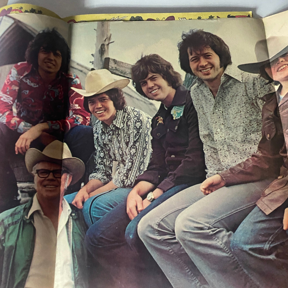 Photo from VTG 16 SPEC Magazine September 1973 showing a group of young men dressed in retro attire, showcasing the fashion style of the 1970s.