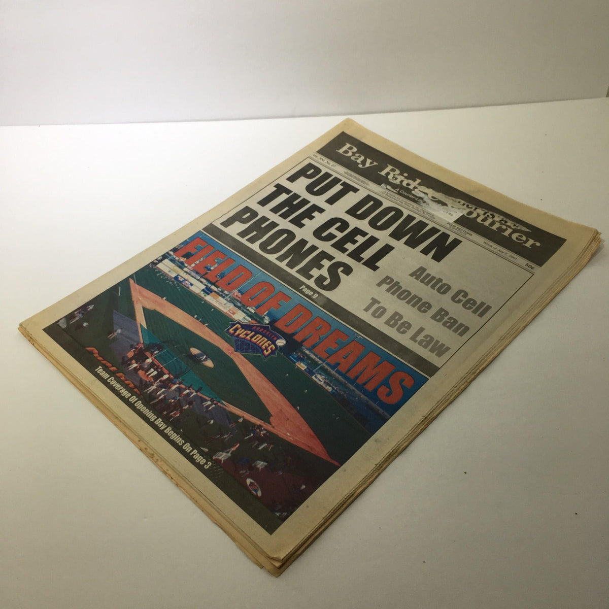 Front view of the Bay Ridge Courier newspaper featuring the headline 'PUT DOWN THE CELL PHONES' and 'FIELD OF DREAMS', part of A Courier Life Publications: 07/2/2001.